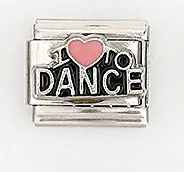 Macro detail of Italian modular charm with I DANCE text and pink heart on stainless steel