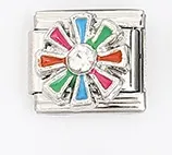 Macro shot of Italian charm link featuring a colorful enamel flower with a small crystal center