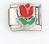Macro shot of Italian charm link featuring a red tulip flower enamel detail on stainless steel