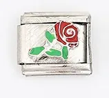 Macro detail of Italian charm link featuring a red enamel rose on brushed steel