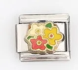 Macro detail of Italian charm bracelet link with colorful enamel flowers on steel