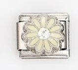 Close-up of Italian style charm with yellow daisy flower and small crystal inlay