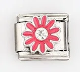 Detailed macro view of a pink enamel daisy Italian charm link with a crystal center
