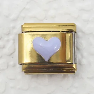 Macro detail of Italian charm link with gold metal base and lavender heart element
