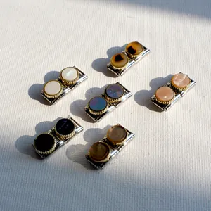 Italian charm bracelet links set with white shell and onyx stones on silver metal