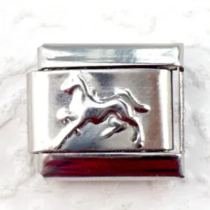 Macro shot of 9mm Italian charm with embossed running horse detail on stainless steel