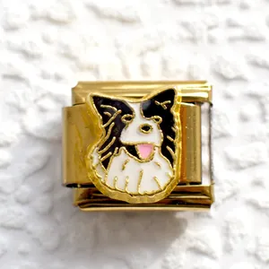 Macro view of gold Italian charm featuring a cute black and white enamel dog pendant