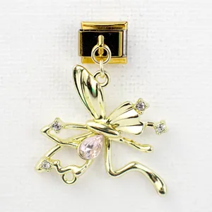 Detailed view of Italian charm link featuring a golden dragonfly with pink teardrop gemstone