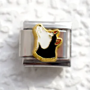 Close-up of an Italian charm featuring a detailed wolf head pattern in colorful enamel