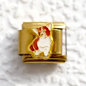 Detail of gold Italian charm link featuring a red and white enamel Corgi dog design