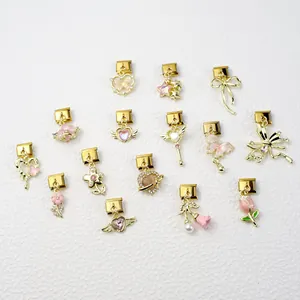 Italian modular charm bracelets featuring pink enamel flowers and butterfly designs