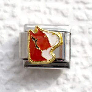 Detailed macro view of an Italian modular charm featuring a red and white dog silhouette