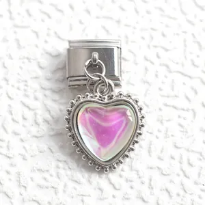 Detailed view of Italian charm link featuring an iridescent heart pendant with beaded edges