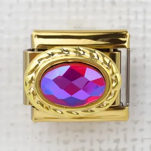Macro detail of Italian gold charm with faceted oval purple gemstone and textured border