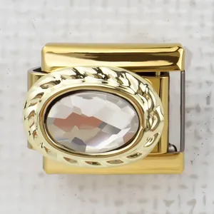 Close-up of Italian style gold link with oval crystal and twisted rope border
