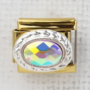 Macro detail of Italian gold charm with iridescent crystal and silver rope border