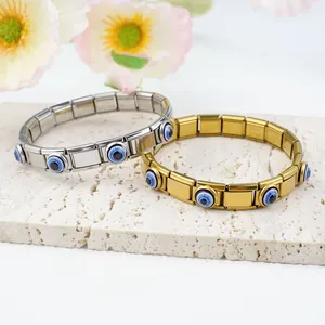 Bracelets à breloques italiens en acier doré et argenté avec charms œil maléfique bleus