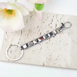 Italian modular charm keychain in stainless steel with Girl Power heart and Eiffel Tower