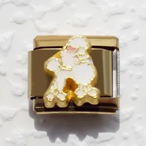 Gold-plated Italian charm bracelet link featuring a white poodle with a pink bow