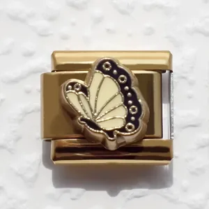 Gold plated stainless steel Italian charm bracelet link with a butterfly enamel charm
