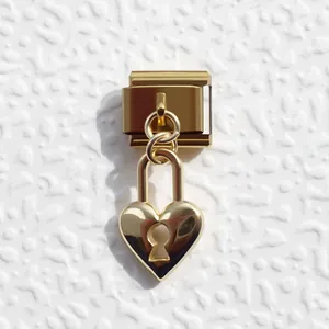 Detail of a golden heart padlock charm for Italian modular stretch bracelets