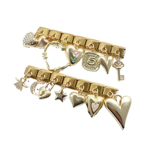 Gold stainless steel Italian charm bracelet with heart charms and vintage coin pendant