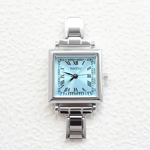 Elegant women's square quartz watch with silver metal band and light blue dial