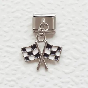 Macro shot of Italian charm link featuring black and white racing checkered flags