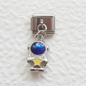 Italian modular charm bracelet featuring a silver astronaut pendant with blue starry enamel