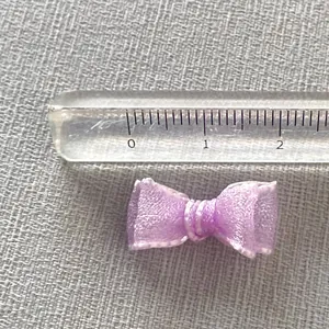 Mini light purple organza bow DIY accessory for nails and crafts measuring 22mm