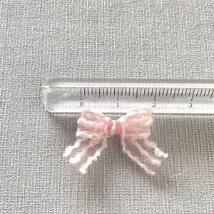 Handmade 2cm mini lace bow ribbon in pink and white fabric for DIY hair accessories