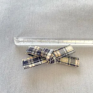 Plaid ribbon bow for DIY doll clothes craft decoration measured at 8cm length