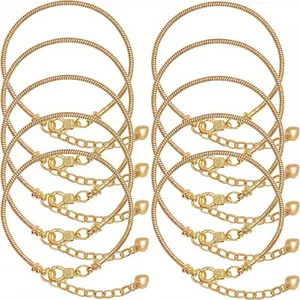 Detailed set of 12 golden snake chain bracelets featuring lobster clasps and heart charms
