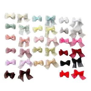 Colorful organza ribbon bows in various styles for DIY nail art and craft accessories