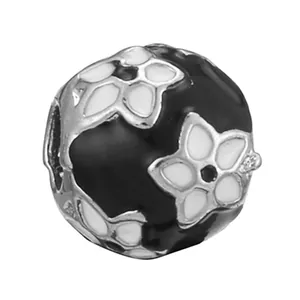 Classic black spherical bead charm with white floral pattern for DIY bracelets