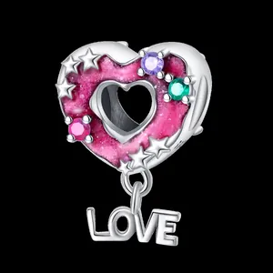 Silver heart charm pendant with pink enamel, multi-color gems and LOVE tag on black background