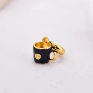 Exquisite black and gold coffee cup charm with heart detail for DIY bracelets