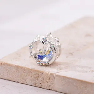 Silver openwork charm with iridescent moon crystal and star pavé for DIY bracelets