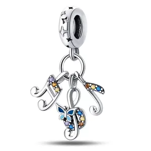 Silver musical note charm with blue enamel butterfly and colorful sparkling zircons