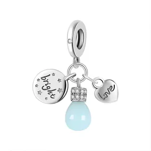 Silver alloy pendant charm with bright and love engravings and a blue teardrop bead
