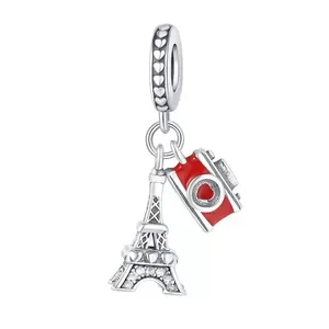 Silver Eiffel Tower and red camera charms with heart details and zircon inlay