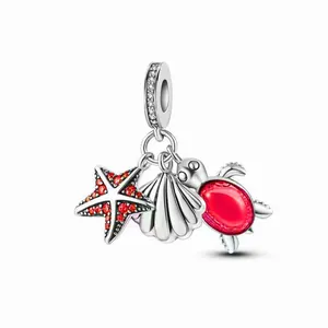 Charm oceano in argento con tartaruga marina rossa, stella marina e conchiglia per gioielli