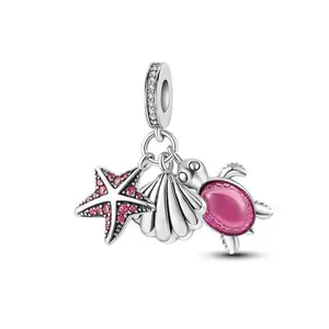 Ciondolo oceano in argento con stelle marine rosa, conchiglia e tartaruga marina pendente