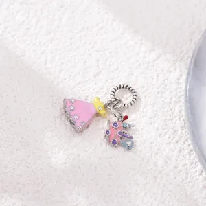 Pink enamel princess dress and castle charms on a textured silver pendant ring