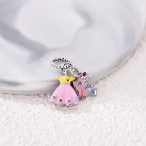 Detailed view of pink princess dress and floral crown alloy charms for DIY bracelets