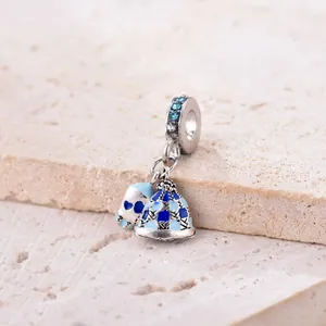 Blue knit hat and glove charm pendant in silver with gradient cubic zirconia stones