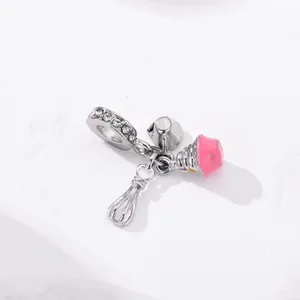 Pink cupcake chef hat and mixer charms on a silver pave bail for DIY bracelets
