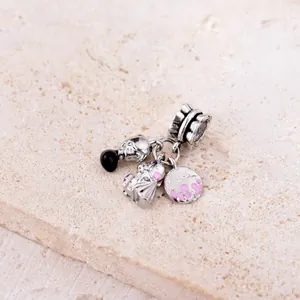 Detailed view of alloy wedding charms featuring a cat and heart engraving for DIY bracelets