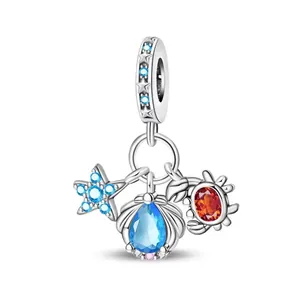 Silver ocean charm with blue star, sea shell, and orange crab pendants for DIY bracelets