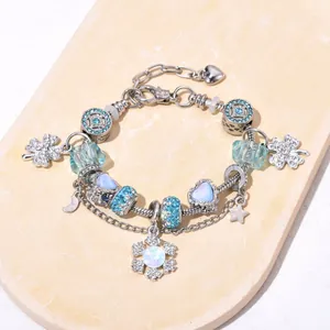 Bracelet à chaîne serpent argentée avec perles de résine bleue et pendentif flocon